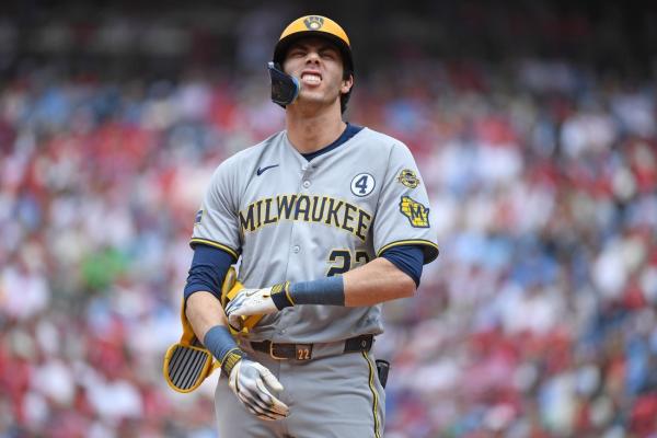 Brewers’ Christian Yelich (hand) leaves after HBP