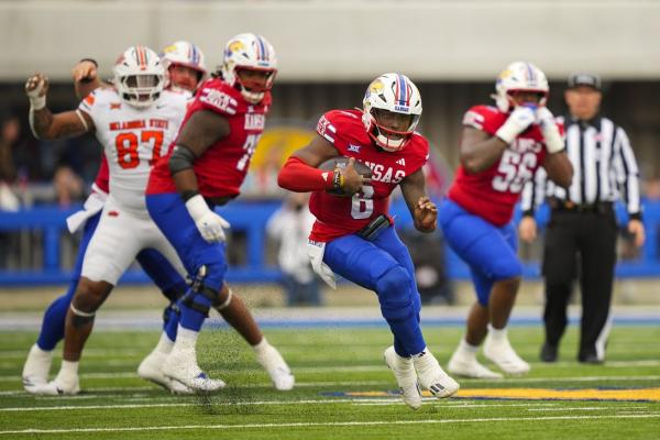 Kansas defeats Oklahoma State behind productive rushing attack
