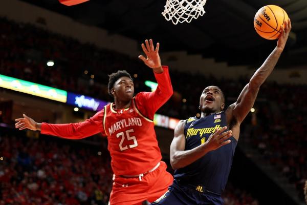 Kam Jones scores 28, helps No. 15 Marquette hold off Maryland