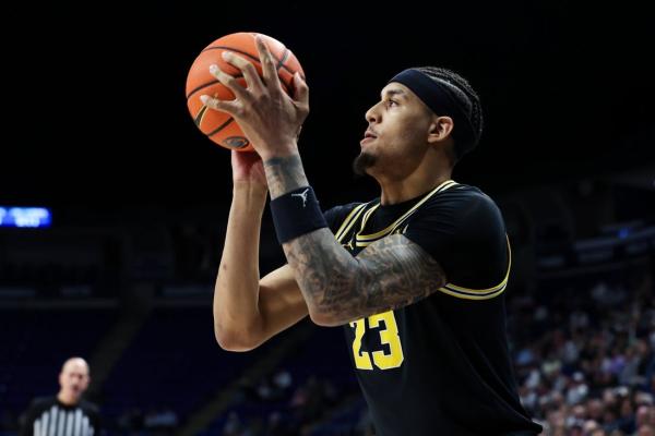 Fresh off close call, No. 2 Michigan takes aim at Wisconsin