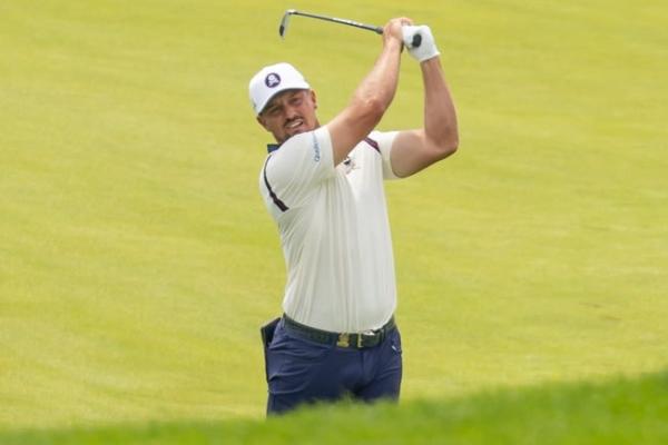 Bryson DeChambeau misses U.S. Open cut; Rory McIlroy survives