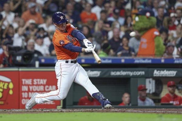 Early power surge guides Astros past Angels