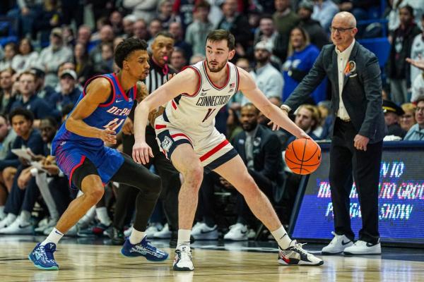 No. 25 Connecticut erupts late, holds off DePaul