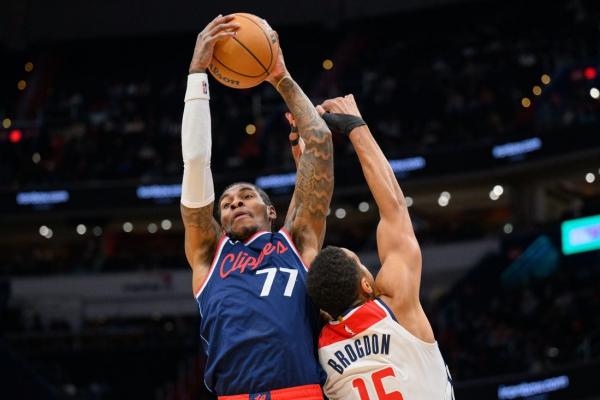 James Harden (43) guides Clippers past skidding Wizards