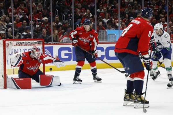 Pierre-Luc Dubois scores both goals for Caps in OT win over Canucks