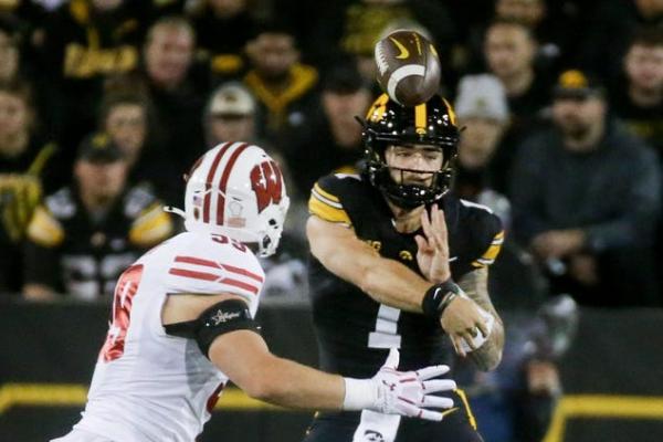 Kaleb Johnson runs for 3 TDs as Iowa rolls past Wisconsin