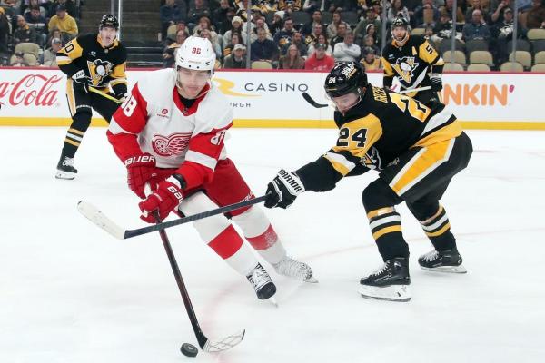 Rookie scores early in OT as Red Wings edge Penguins