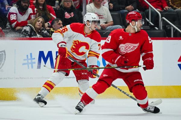 Red Wings extend dominance over Flames with OT win