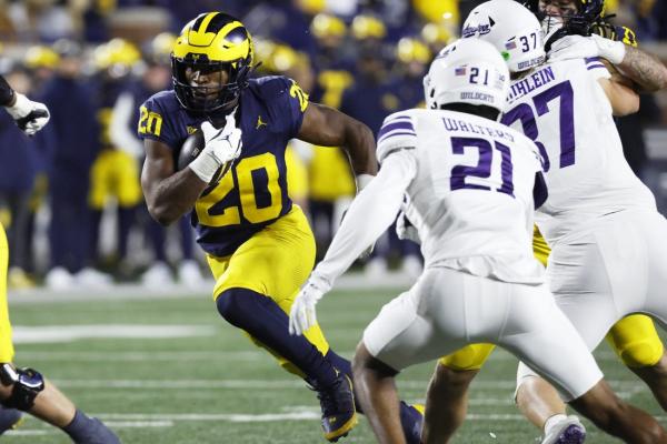 Michigan hammers Northwestern to become bowl eligible