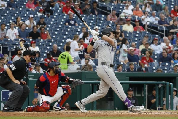 Rockies crack seven homers, hand Nationals 10th straight loss