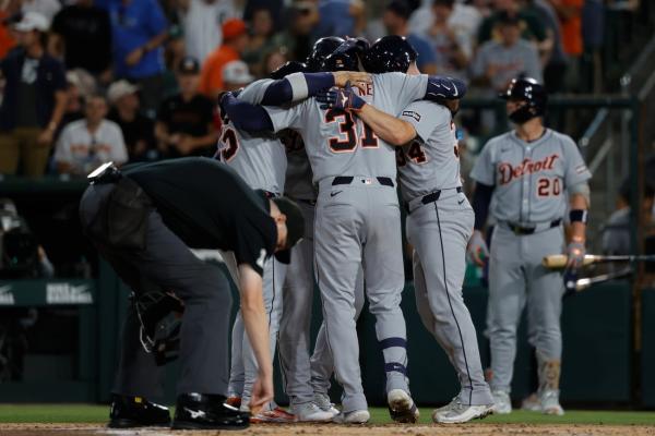 Athletics use walk-off walk to down Tigers