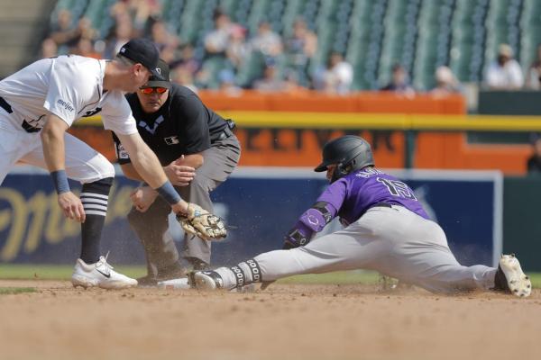 Rockies score twice in ninth, avoid sweep against Tigers