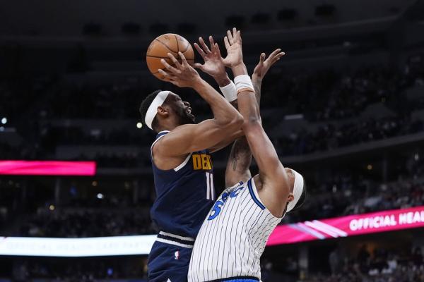 Nikola Jokic becomes assist king among centers as Nuggets top Magic