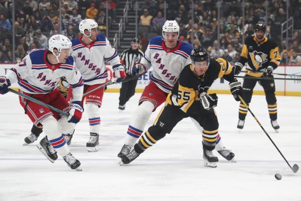 Adam Fox helps Rangers slide past Penguins