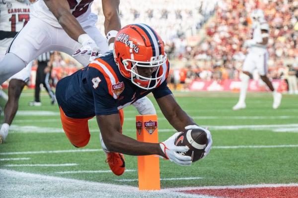 No. 20 Illinois holds off No. 15 South Carolina for rare 10th win