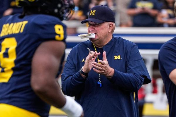 Michigan’s players ‘feel very betrayed,’ says interim coach Biff Poggi