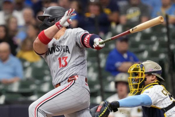 Twins score 12th straight win by downing Brewers