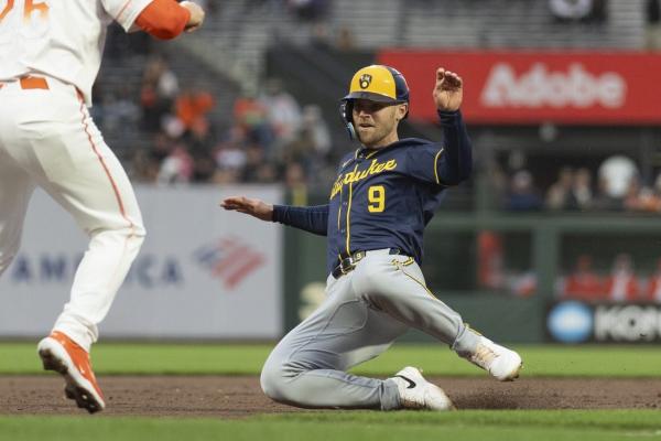 Bullpen locks down Brewers' win over Giants thumbnail