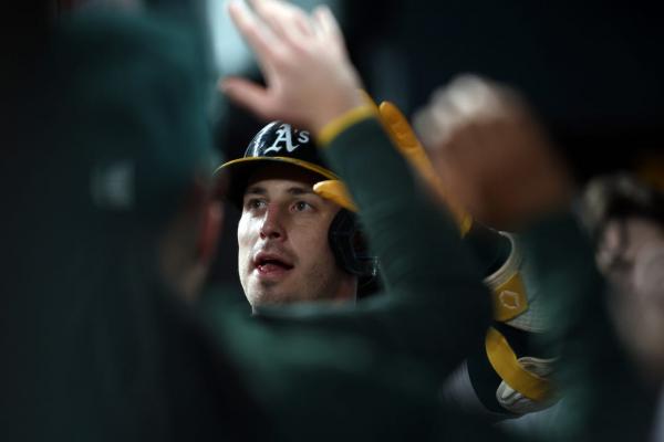 A’s power surge continues in rout of Rangers