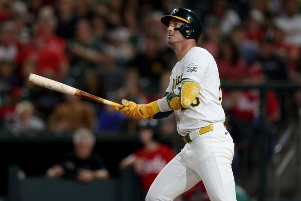 Athletics take control late to defeat Reds