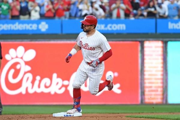 Philliesâ Kyle Schwarber (elbow) exits after setting leadoff HR record