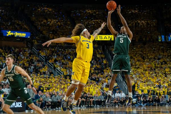 No. 14 Michigan State tops No. 12 Michigan, leads Big Ten