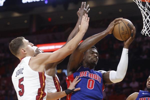 Heat turn away Pistons for first home win