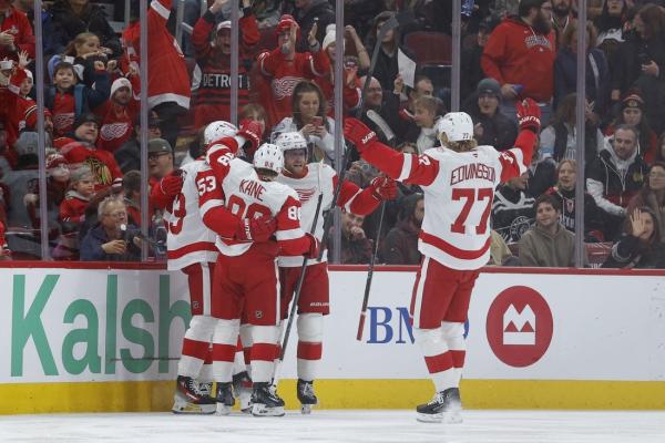 Alex DeBrincat's 2 goals back G John Gibson as Red Wings blank Blackhawks