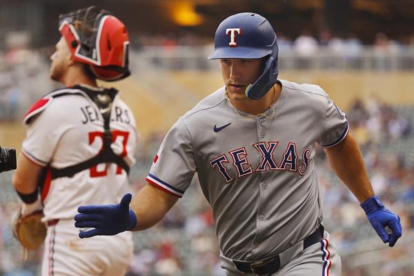 Power surge carries Rangers to rout of Twins