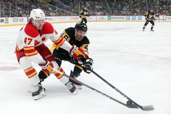 Penguins build 5-goal lead, coast past Flames