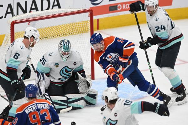 Ryan Nugent-Hopkins’ hat trick lifts Oilers over Kraken