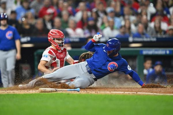 Cubs score in bunches to down Phillies