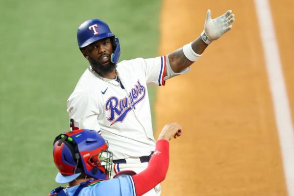 Benched Rangers OF Adolis Garcia working on mechanics