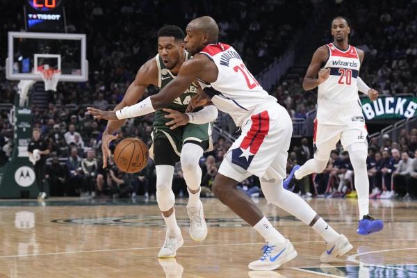 Giannis Antetokounmpo, Bucks top Wizards in Khris Middleton’s return