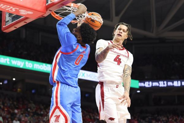 No. 23 Ole Miss fends off Arkansas comeback bid