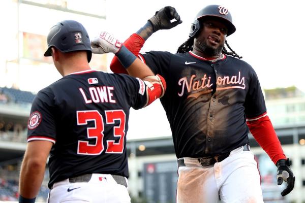 Josh Bell, Daylen Lile power Nationals past Reds