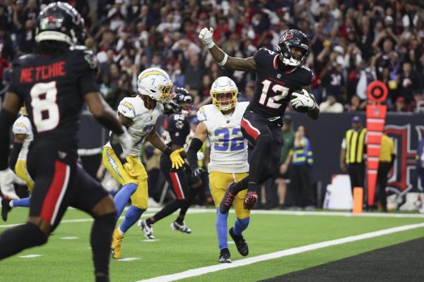 Texans devour Chargers for wild-card victory