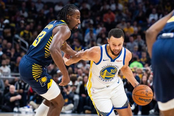 Pacers rally late, upend Warriors to notch first win of season