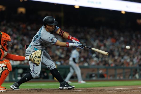 Marlins squander late lead, knock off Giants in 10