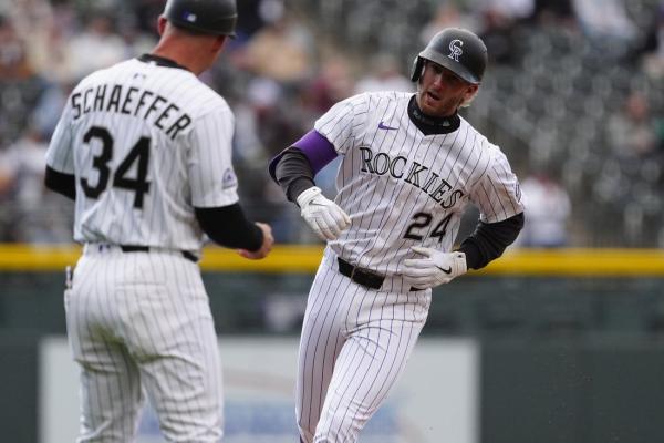 AL-best Tigers break tie in 10th, keep Rockies reeling