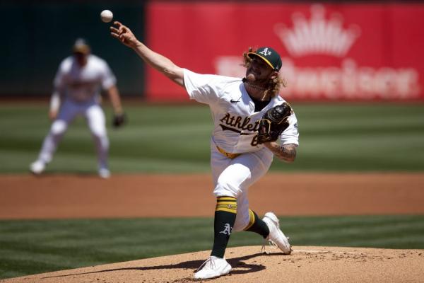 Athletics use four-run inning to knock off Brewers