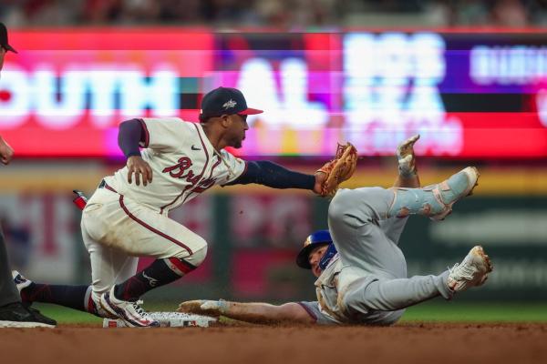 Braves rally late, edge Mets on sac fly in 10th
