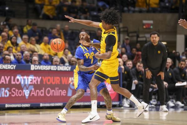 West Virginia downs Pitt 71-49 in rivalry tilt