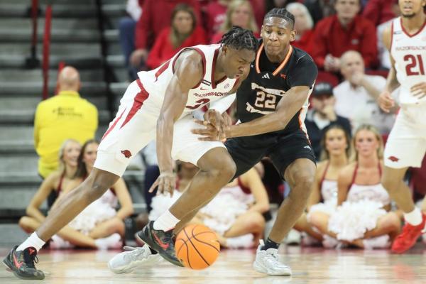 No. 20 Arkansas fends off upset-minded Pacific