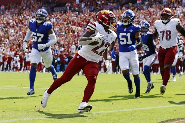 Commanders hold firm to spoil Russell Wilson’s Giants debut