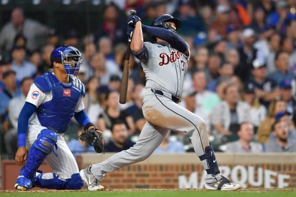 Tigers power past Cubs with pair of 4-run innings