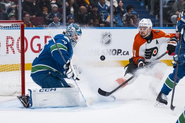 Flyers rally past Canucks for 14th comeback win